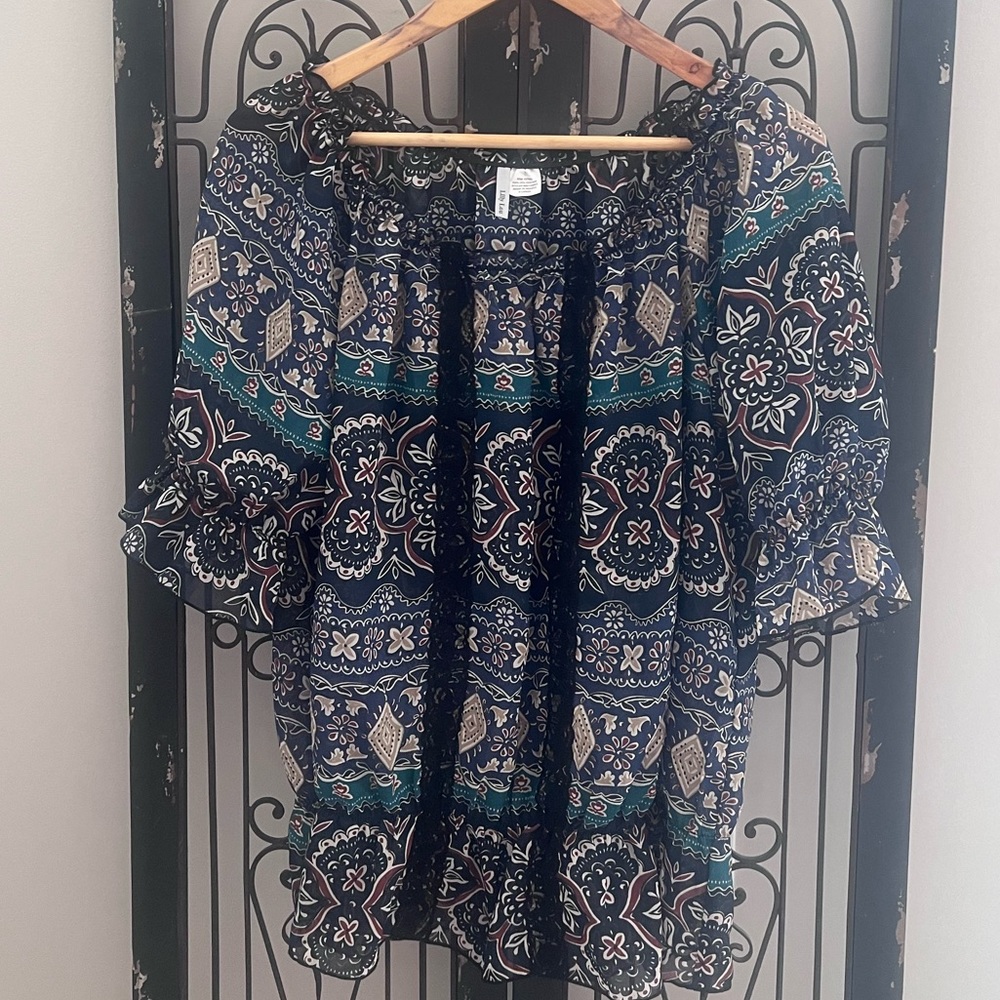 Sheer elastic babydoll top with cinched bottom